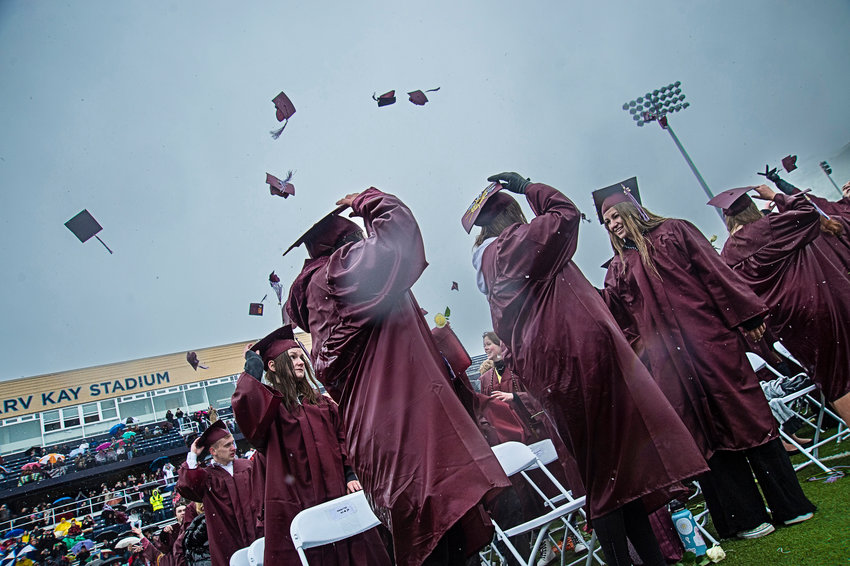 Graduates of Golden High School’s Class of 2022 toss their mortarboards just as the rain began to change into snow. The 280 graduates celebrated as the school concluded its 148th commencement ceremony.